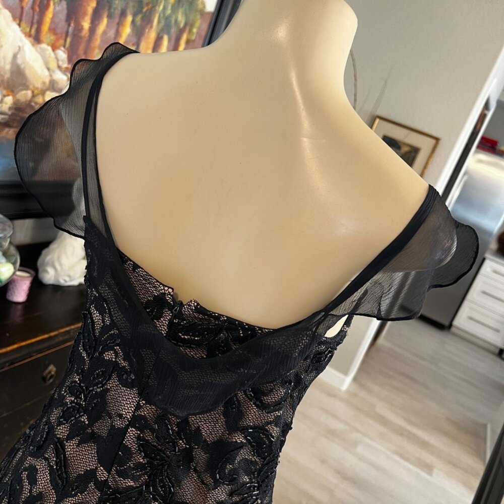 cach'e black lace overlay w/black sequins over skin tone polyester lining DRESS
